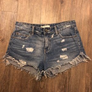 Free people fringed denim shorts